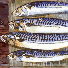 three fish sitting on top of a wooden table