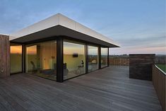 a large open room on top of a wooden deck