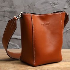 Overview: Design: Cute Black LEATHER WOMEN Bucket SHOULDER BAG Barrel Crossbody Purses FOR WOMENIn Stock: 3-5 days For MakingInclude: A Shoulder BagCustom: NoLeather: CowhideMeasures: L 22cm x W 12cm x H 25cmWeight: 0.43 kgSlots: 1 main slot, 1 inner slot,Accessories(option): NoneStyle: Cute Black LEATHER WOMEN Bucket SHOULDER BAG Barrel Crossbody Purses FOR WOMENVery durable (At least 5 Years) and it should last a life time Note: Each Item will have very slight variances to the pictured Item, a Everyday Fall Bucket Bag, Fall Everyday Bucket Bag, Rectangular Soft Leather Bucket Bag, Elegant Bucket Bag For Business, Fall Shoulder Bag For Office, Leather Hobo Bag For Business, Hobo Bag With Adjustable Strap For Work, Adjustable Strap Hobo Bag For Work, Cognac Crossbody Hobo Bag