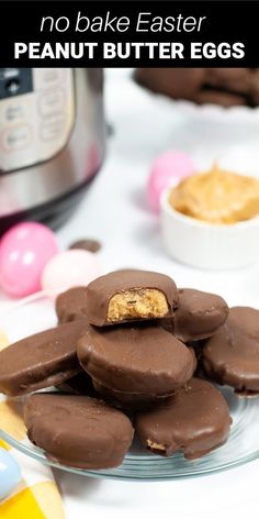 chocolate peanut butter eggs on a plate with an instant pressure cooker in the background