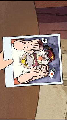 a person holding up an image of food