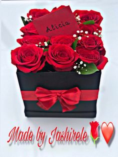 a black box with red roses in it and the words made by ashiele