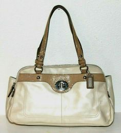 Coach Penelope Leather Satchel Bag #16529  The beige soft milked cowhide bag  Genuine leather  Python embossed leather trim on the bag  19" Leather handles have 8" drop  Front pocket has turn-lock closure  Center compartment has hidden magnetic snap closure  Back compartment has zip-top closure  Back compartment has zippered pocket with leather pull  Front compartment has zip-top closure  Front compartment has two slip pockets  Fully lined in satin fabric  COACH leather hang tag  Size: 14" (L) x Classic Pre-owned Shoulder Bag With Double Handle, Pre-owned Satchel For Formal Occasions, Pre-owned Satchel Shoulder Bag, Pre-owned Satchel Shoulder Bag For Shopping, Vintage Coach Satchel With Handles, Pre-owned Elegant Leather Shoulder Bag, Elegant Pre-owned Leather Shoulder Bag, Cowhide Bag, Leather Satchel Bag