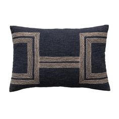 a black and gold pillow with two square shapes in the middle, on a white background