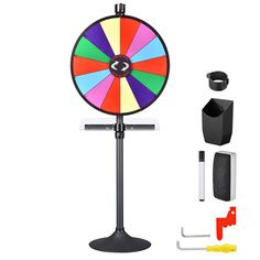 a colorful spinning wheel with tools for making it