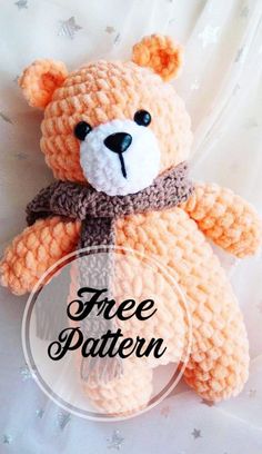 a crocheted teddy bear sitting on top of a white sheet with the words free pattern below it