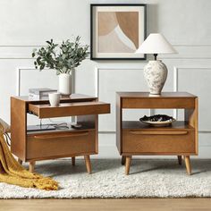 two wooden end tables sitting on top of a white rug