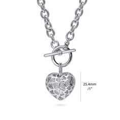 This puffed heart pendant necklace's bedazzled beauty and lustrous silver tone are what makes this the perfect gift for her. Crafted with base metal alloy, silver-tone, nickel free. Set with premium grade round cubic zirconia CZ in pave setting. Chain measures 18" in length. Toggle clasp. Pendant measures 1"(L), 1"(W). Get the look of celebrity inspired jewelry. BERRICLE Cubic Zirconia (simulated diamond) jewelry are made with flawless high quality CZ stones. Individual stone is carefully hand-s Nickel-free Silver Heart Necklace, Silver Nickel-free Heart Necklace, Silver Charm Necklace With Toggle Clasp, Elegant Silver Toggle Necklace With Heart Charm, Silver Heart Necklace With Toggle Clasp For Gift, Silver Heart Pendant Toggle Necklace, Silver Heart Toggle Necklace As Gift, Silver Heart Toggle Necklace For Gift, Elegant Metal Toggle Necklace For Valentine's Day