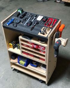 a workbench with tools and other items on it