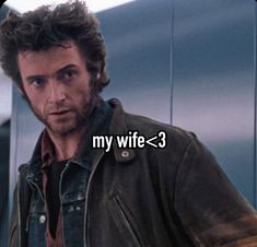 a man in a leather jacket with the words my wife = 3