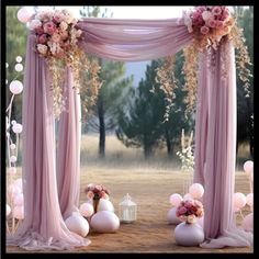 an outdoor wedding setup with pink and white flowers on the drapes, balloons and lanterns