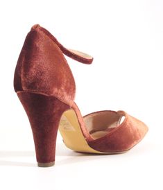 Crafted from sumptuous rust velvet, these beauties from Chelsea Crew add a touch of elegance to any outfit. The adjustable ankle strap ensures a snug fit while providing that extra flair you crave. With a chic peep toe design, your pedicure will steal the spotlight! Complete with a 3.5 inch heel.This is a Special Order item, please allow a 2-3 day handling time.Available while supplies last. Glamorous Ankle Strap Heels For Fall, Velvet Heels For Evening, Velvet Evening Heels, Brown Fitted Ankle Strap Heels, Fitted Brown Heels With Ankle Strap, Elegant Velvet Heels For Formal Occasions, Elegant Velvet Party Heels, Brown Fitted Evening Heels, Fitted Brown Heels For Evening