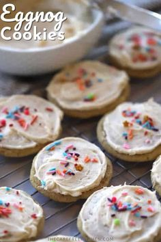 cookies with frosting and sprinkles on a cooling rack