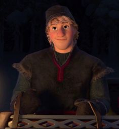 an animated character is sitting in front of a lit candle and looking at the camera