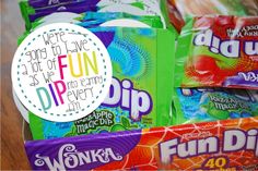 a pile of fun dips sitting on top of a wooden table