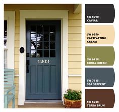 a blue front door with white trim and brown accents