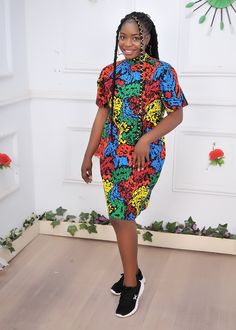 Turtle Neck Multicolor African Ankara Evening Formal Knee Length Short Sleeve Dress with Pockets, Summer Shift Dress, Women's Clothing this beautifully crafted classy, easy-to-wear ankara dress is made with 100% cotton African wax print floral fabric. it is suitable for both formal and informal occasions. Features: - 100% Handmade - Fitted with zipper at the back - Short sleeve - Pocket at both sides - Knee length - Length of dress on the model is 38inches Buyers can request customization if the measurement is different from the standard.  Production takes 3-5 business days and delivery takes 3-5 business days to most countries of the world. Standard Size Measurements are as follows: Size chart UK 4, US 0 Bust: 30 Waist: 22.5 Hip: 32.5 UK 6, US 2 Bust: 33 Waist: 25.5 Hip: 35 UK 8, US 4 Bus Vibrant Fitted Multicolor Dress, Vibrant Multicolor Fitted Dress, Multicolor Vibrant Print Knee-length Dress, Multicolor Vibrant Print Knee-length Mini Dress, Multicolor Knee-length Dress With Vibrant Print, Multicolor Short Sleeve Mini Dress With Vibrant Print, Vibrant Multicolor Print Knee-length Dress, Multicolor Vibrant Print Dress, Multicolor Knee-length Mini Dress With Vibrant Print