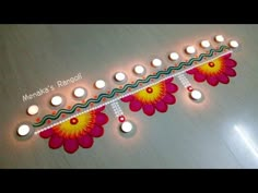 diwali decoration with candles on the floor