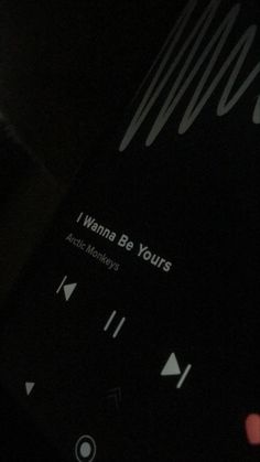 a close up of an electronic device with the text i wanna be yours on it