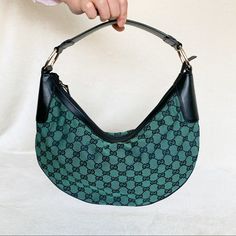 The Hobo Bag Is Back! Chic And Cute! Gg Canvas Green/Abony Color Pattern Black Leather Trim Leather Shoulder Handle W/ D Rings Zip Closure Inside Fabric Liner Fully Lined Inside Zip Pocket Measurements Approximately 15in L X 8in H X 3in D, Drop 8in To 10in. Green Gucci Bag For Everyday Use, Green Gucci Shoulder Bag For Daily Use, Daily Use Green Gucci Shoulder Bag, Gucci Green Shoulder Bag For Daily Use, Gucci Designer Handheld Shoulder Bag, Designer Gucci Handheld Shoulder Bag, Green Gucci Shoulder Bag For Shopping, Gucci Green Shoulder Bag For Shopping, Green Gucci Bag With Gold-tone Hardware