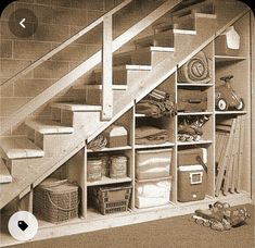 an image of a staircase with storage under it