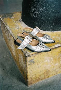 These Silver Metallic Feminine Buckle Ballerinas feature flatly squared block heels, slingback straps, large metallic buckles with eyelet details and engraved GANNI logos. 40% Rec PES 18% Rec PU 18% PU 14% Other 10% Wood Flatly squared block heels Slingback straps Large metallic buckles with eyelet details Engraved GANNI logos Fits true to size, take your normal size Ganni Shoes, Heels Slingback, Heel Accessories, The Ballet, Silver Sandals, Fashion Baby, Silver Accessories, Flat Boots, Denim Flares