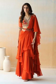 Orange Ruffle Saree, Ruffle Lehanga For Women, Ruffle Half Saree, Ruffle Hands Blouse Designs, Ruffle Saree With Belt, Customised Lehenga, Ruffle Saree Designs, Haldi Outfits, Saree With Belt