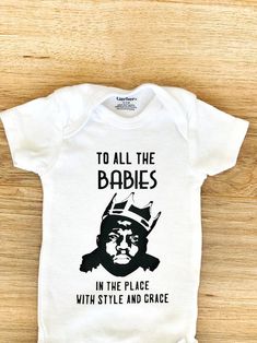 a white baby bodysuit with the words to all the babies in the place with style and grace