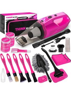 a pink hair dryer and other items in front of it