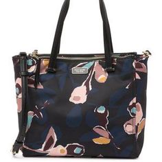 Shop Women's kate spade Size OS Totes at a discounted price at Poshmark. Description: Abstract floral print details the exterior of a textile constructed satchel that features various organizational compartments and pockets, and contrasting leather top handles. - Detachable, adjustable shoulder strap - Magnetic button tab closure - Interior features 2 outer zip compartments, 1 wall zip pocket, and 2 media pockets - Approx. 10" H x 10.5" W x 4" D - Approx. 7" handle drop, 19-24" shoulder strap Kate Spade Purse Black, Pink Crossbody Bag, Paper Rose, Quilted Crossbody Bag, Kate Spade Purse, Kate Spade Handbags, Black Nylons, Black Handbags