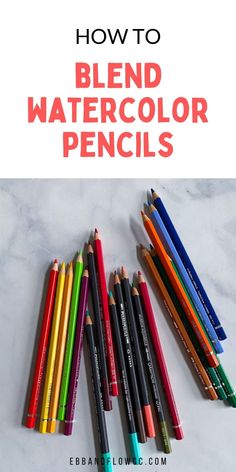 colored pencils lined up next to each other with text overlay how to blend watercolor pencils