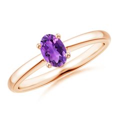 Mounted on the sleek 14k rose gold shank is an oval amethyst in a four-prong setting. The velvety purple gem sparkles away beautifully. This classic amethyst ring is designed to enthrall. Rose Gold Solitaire Ring, February Birthstone Jewelry, Yellow Gold Solitaire Ring, Purple Gems, Gold Solitaire Ring, Contemporary Ring, Rings For Girls, Diamond Solitaire Rings, February Birth Stone