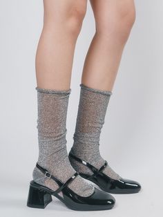 Editor's Notesmeminn's socks collection is unique and playful for everyday casual look.- Sheer glitter socks- Soft texture- Can be worn slouchy or straighten upMeasurement - Foot Length: 7.9  in.- Leg Length: 10.2 in.- Leg Width: 4.7in.Composition & Care- 100% Polyester- Hand wash in lukewarm water with a neutral detergent- Do not bleachDesigner- by meminn Sheer Knee High Socks, Sheer Fitted Nylon Socks, Sheer Socks Mary Janes, Sheer Ankle Socks, Stretch Multicolor Knee-high Socks, Socks Collection, Glitter Socks, Knee Socks, Soft Texture