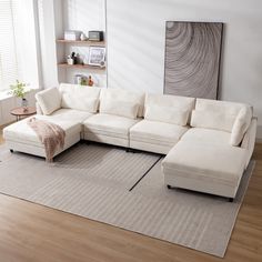 a living room with a large sectional couch