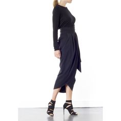 The Blake Tulip skirt is super flattering on any size. Coming in one size fits all, this wrap-around tulip style is designed to sit high on the waist. It's finished with a wrap-around belt that ties at the side, to nip in your waist for a flattering effect. Tie into a bow or leave as it is. This dramatic outline is best complemented with a fitted top. Hand wash recommended Wash with like colours to avoid colour transfer Press on reverse side Iron on low heat  100% polyester Plum Midi Dress, Black Tulips, Tulip Skirt, Fitted Top, Red Top, Independent Designers Fashion, Wrap Skirt, Price Match, Fashion Jewellery