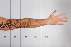 a man's arm with tattoos on it and the measurements for each arm length