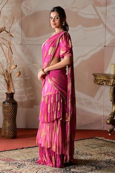 Pink shaded banarasi georgette pre-draped sharara saree with circular motifs embroidery. Comes with a crepe blouse with cutdana hand work. - Aza Fashions Bollywood Designer Wear Sets With Draped Sleeves, Bollywood Sets With Draped Sleeves For Designer Wear, Bollywood Style Sets With Draped Sleeves For Designer Wear, Bollywood Style Festive Sets With Draped Sleeves, Bollywood Festive Sets With Draped Sleeves, Festive Bollywood Sets With Draped Sleeves, Festive Diwali Sets With Draped Sleeves, Festive Sets With Draped Sleeves And Traditional Drape, Silk Bollywood Draped Sharara