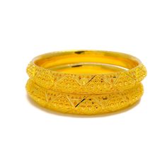 This pair of bangles is crafted from 22k gold, weighing a substantial 57.1 grams, and features a stunning yellow gold finish. Each bangle is sized at 2.8 inches with a 2.5-inch diameter, showcasing bold striped detailing that offers a look of extravagance and striking elegance. These bangles are not openable, which enhances their sleek and seamless silhouette. Ideal for those seeking to make a powerful fashion statement, this pair adds a touch of opulence and style to any ensemble, perfect for s Festive Yellow Bangle Jewelry, Festive 22k Gold Bangle, Traditional Yellow Gold Bangle Bracelet, Traditional Yellow Bangle Jewelry, Festive Yellow Bangle Bracelet, 22k Gold Round Bangle For Formal Occasions, 22k Gold Bangle For Formal Occasions, Formal 22k Gold Round Bangle, Gold Plated Bangle For Festivals