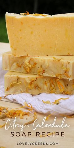 three soap bars stacked on top of each other with the words citrus calendaia in front of them