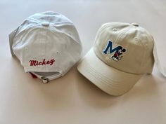 Embroidered Mickey Mouse M Logo. "Mickey" Embroidered on back. Adjustable Strap. 52cm Head Circumference (~3-5y) Disney Items are Final Sale. Casual Cotton Hats With Mickey Mouse Detail, Casual Cotton Mickey Mouse Hats, Casual Mickey Mouse Baseball Cap, Adjustable Cotton Mickey Mouse Hat, Mickey Hat, Disney Items, Kids Hat, M Logo, Toddler Kids