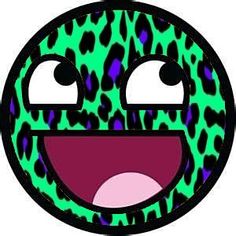 a green and black leopard print circle with eyes, mouth, and tongue sticking out