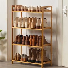 PRICES MAY VARY. [💕4 TIER ADJUSTABLE BOOTS RACK WOOD💕] If your husband collects boots, or your wife collects ankle boots, the adjustable boot rack fits all his/her boots and the rest of the family’s shoes. You get different heights, great from shoes to tall boots.This is a great entry way piece, then fill with all the shoes you need! [👏EASY TO INSTALLATION👏] Boot rack are quick and easy to assemble. but one tip is to only hand tighten the screws at first until it’s all assembled and then go Boot Shoe Rack, Wooden Shoe Rack, Modern Organization, Bamboo Shoe Rack, Boot Rack, Wooden Shoe Racks, Bamboo Shelf, Shoe Rack Organization, Shoe Storage Shelf