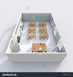 an overhead view of a room with desks and chairs