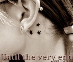 a woman's behind the ear tattoo with stars on her left side, saying until the very end