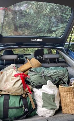 there are many bags in the back of this truck and it's packed up