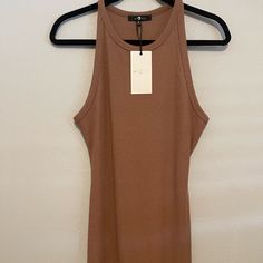 7 For All Mankind Nwt Brown Ribbed Dress. It Is A Racerback Dress Form Fitting With A Fish Tail Bottom. A Sexy Dress That Can Be Styled Up Or Down! Casual Fitted Tank Dress, Fitted Racerback Bodycon Dress For Spring, Spring Racerback Bodycon Dress, Spring Bodycon Dress With Racerback, Casual Fitted Tank Mini Dress, Spring Bodycon Racerback Mini Dress, Fitted Racerback Mini Dress, Brown Ribbed Dress, Stretch V-neck Brown Tank Top