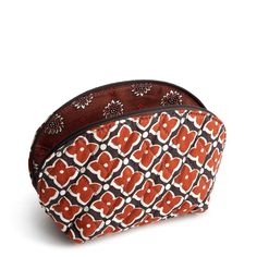 Our Mini Dome Cosmetic is perfectly sized to fit in your purse, handbag, or travel tote, making it ideal for carrying your essential makeup items on the go without taking up too much space. Whether you're touching up your makeup during the day or packing light for a weekend getaway, our compact bag offers the perfect solution for keeping your beauty essentials close at hand. Vera Bradley Mini Dome Cosmetic Bag in Moorish Orange/Black Multicolor Portable Cosmetic Bag For Everyday, Everyday Portable Multicolor Cosmetic Bag, Portable Multicolor Cosmetic Bag For Everyday Use, Versatile Brown Pouch For Daily Use, Portable Multicolor Cosmetic Bag, Versatile Brown Pouch Cosmetic Bag, Brown Versatile Cosmetic Bag For Daily Use, Versatile Brown Cosmetic Bag For Daily Use, Versatile Brown Cosmetic Pouch