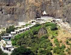 a large building on the side of a mountain