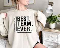 Custom Team Sweatshirt, Team Name Sweatshirt, Coworker Christmas Gift, Team Member Hoodie, Work Team Coworkers, Teammate Shirt, Work Gift, Custom Team Hoodie,Team Name Sweatshirt,Coworker Christmas,Team Member Hoodie,Work Team Coworkers,Teammate Sweatshirt,Work Gift,Staff Appreciation,Best Team Ever,Matching Sweatshirt,Family Reunion,Coworker Gift Idea,Teacher Sweatshirt  Greetings and welcome to my store! I'm thrilled to have you here, and my top priority is to make sure you're happy with your Personalized Tshirts, Coworkers Christmas, Quotes Shirt, Video Games Gift, Team Sweatshirts, Christmas Gifts For Coworkers, Gamer Shirt, Matching Sweatshirts, Gamer Humor