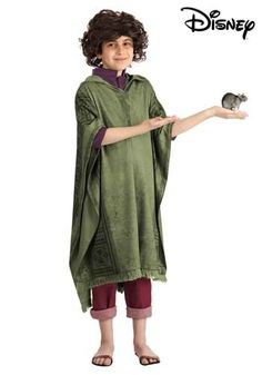 a young boy dressed in disney's ponchy ponchy is holding a mouse